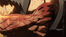 a man 's arm is covered in blood and sweat