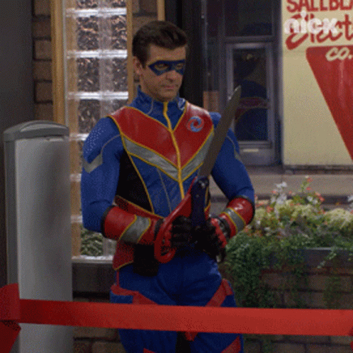 a superhero attempts to cut red tape