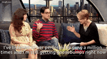 a man and a woman are sitting on a couch talking to a woman who says " i 've listened "