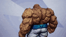 the back of a cartoon character with a blue belt