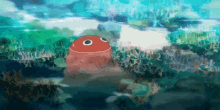 a red object with a white circle in the middle is floating in the ocean