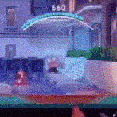 a blurred image of a video game with a score of 560 on the screen .