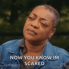 a woman in a denim jacket says now you know im scared