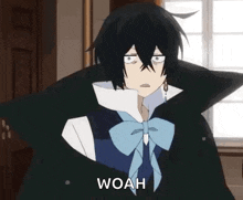 a black haired anime character with a bow tie is standing in front of a window and making a funny face .