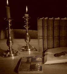 a stack of books on a table with one titled ' a brief history of the world '