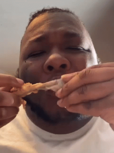 black people eating chicken