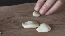 Cutting Garlic Two Plaid Aprons GIF - Cutting Garlic Two Plaid Aprons Chopping Garlic GIFs