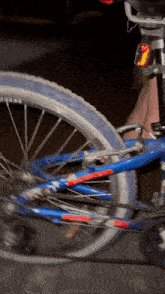 a person is riding a bike with a sticker on the back that says ' united states ' on it