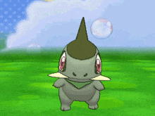 a cartoon character with a horn on its head is standing in a grassy field