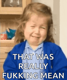 a little girl crying with the words that was really fuking mean