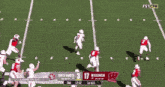 a football game between south dakota and wisconsin is going on