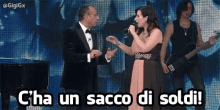 C'Ha Un Sacco Di Soldi GIF - Laura Pausini Carlo Conti Sanremo GIFs