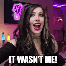 a woman with her mouth open and the words " it wasn 't me " behind her