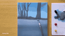 a painting by joony art is on a table