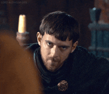 a close up of a man 's face with the words lord-aldhelm gifs visible