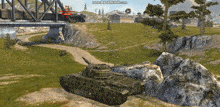 a video game screen shows a train going under a bridge and a tank in the foreground