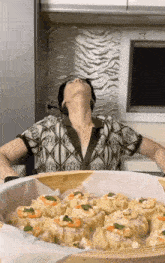a woman is sitting in front of a basket of food