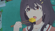a girl is eating something with chopsticks and the letters bs11 are visible in the corner