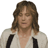 a woman wearing a white shirt and black suspenders is making a funny face