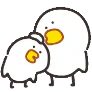a couple of birds with yellow beaks are standing next to each other .