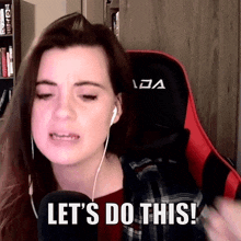 a woman wearing headphones says let 's do this while sitting in a gaming chair