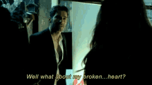 a man in a suit is talking to a woman and the words well what about my broken heart
