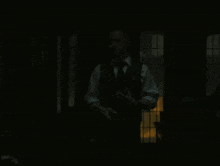 a dark room with a sign that says ' ton ' on it