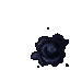a black stain on a white surface with a hole in it .