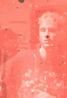 a man wearing a t-shirt with a group of people on it