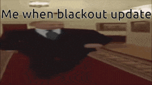 a man in a suit and tie is walking down a hallway with the words me when blackout update above him
