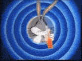 bugs bunny is holding a carrot in his mouth in a blue circle
