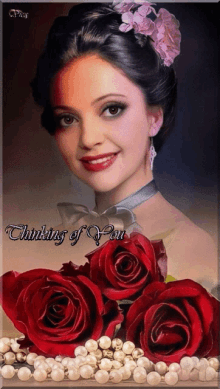 a picture of a woman with red roses and pearls with the words thinking of you on the bottom