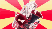 a girl with white hair and horns is holding a megaphone in front of a red and yellow striped background .