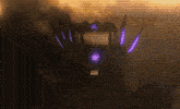 a dark room with a purple light in the middle of it