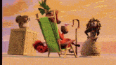 a squirrel sits on a box next to a cartoon character in a chair