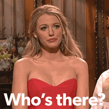 a woman in a red dress with the words who 's there below her