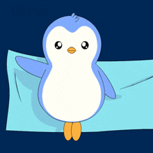 a blue and white penguin laying on a blue blanket