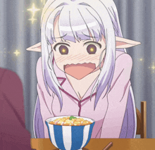 a girl with a surprised look on her face is sitting at a table with a bowl of food
