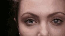 Makeup Makeup GIF - Angelina Jolie Eyes Blink GIFs