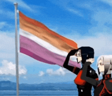 a couple of anime characters standing next to a flag .