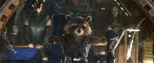 rocket raccoon from guardians of the galaxy is sitting in a chair holding a sword .