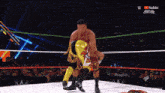 two wrestlers are fighting in a ring with a youtube logo on the bottom