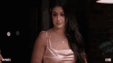 a woman in a pink dress with the hashtag mafs