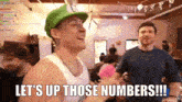 a man in a green hat says " let 's up those numbers !!! "