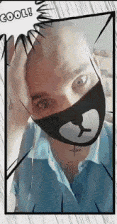 a bald man wearing a teddy bear face mask with a comic speech bubble that says cool