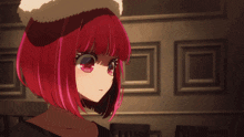 a close up of a girl with red hair and a hat