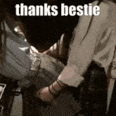 a person is holding another person 's waist with the words `` thanks bestie '' written on the bottom .