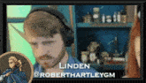 a picture of a man with headphones and the name linden on the bottom