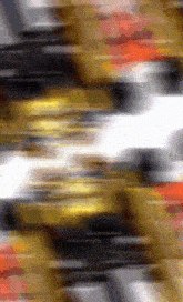 a blurry picture of a yellow and black colored background