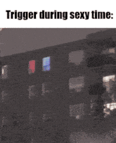 a picture of a building at night with the words trigger during sexy time